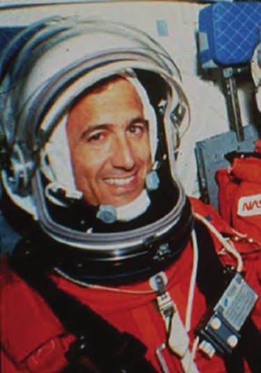 Astronaut and Scientist Dr. Larry DeLucas in spacesuit