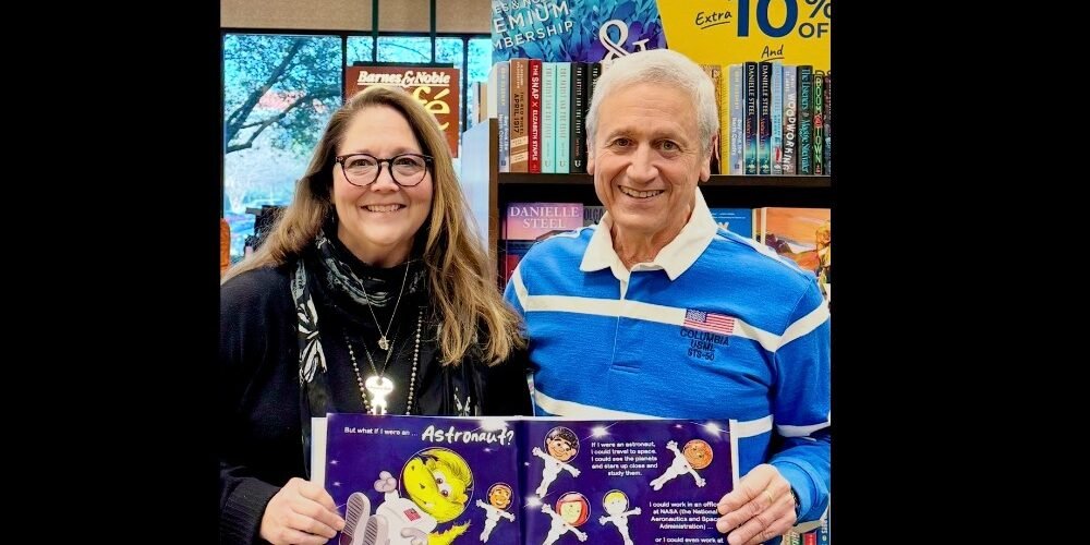 Gwen Renee' and Astronaut Dr. Larry DeLucas